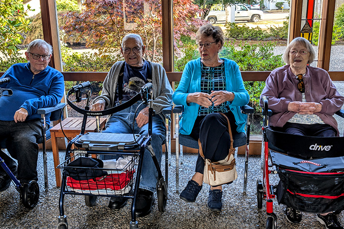 Congregants chatting with each other in the narthex